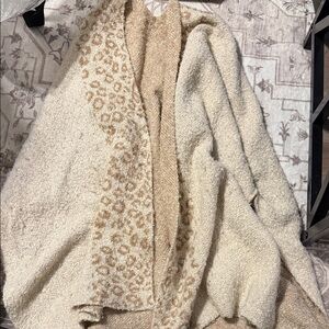 Cheetah cardigan with arm pockets as shown in second photo .